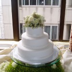 White Wedding Cake with Fresh Floral Topper