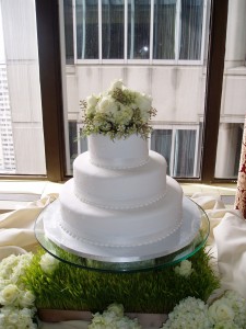 White Wedding Cake with Fresh Floral Topper White Wedding Cake with Fresh Floral Topper