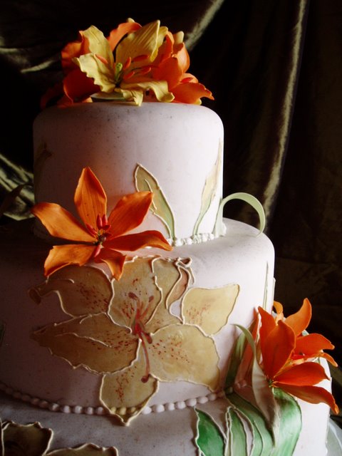Wedding Cake with Orange Sugar Paste Lilies and Hand Painted Relief Lilies