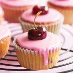 Simple cupcake with cherry on top
