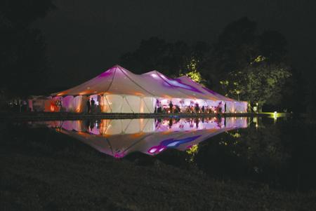 Wedding Reception Tent Lights Up The Night An outdoor wedding is an 