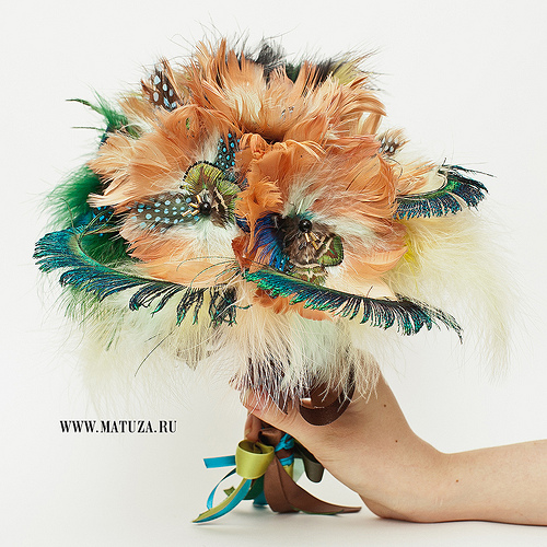 peach and teal blue feather bouquet peach and teal blue feather bouquet1 5 Out of the Ordinary Wedding Bouquets