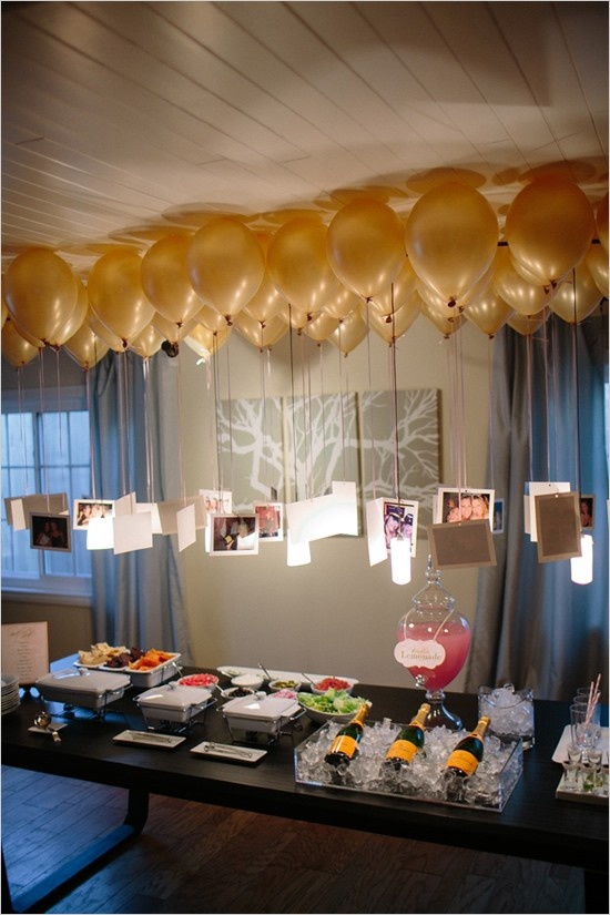 photos hung from ballons as backdrop 5 Fun Ways to Use Balloons at Your Wedding