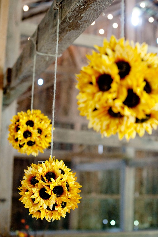 DIY silk sunflower pomanders silk sunflower pomanders 5 Really Cute, Totally Do able DIY Wedding Projects